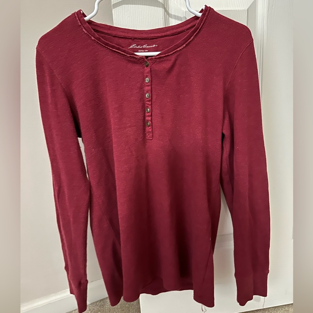 Distressed red sweater